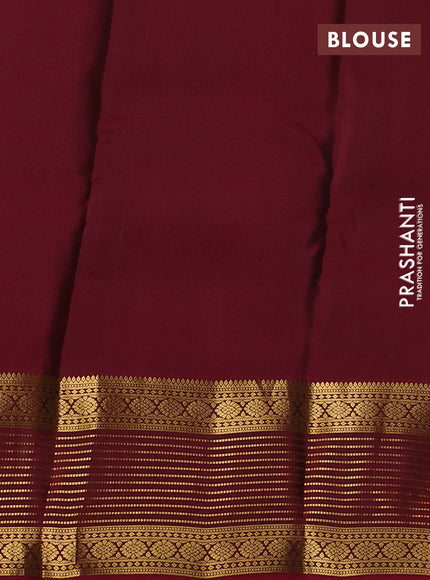 Kanchipuram silk saree green and maroon with allover zari woven buttas and zari woven korvai border