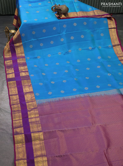 Kanchipuram silk saree dual shade of bluish green and magenta pink with zari woven buttas and rettapet zari woven border