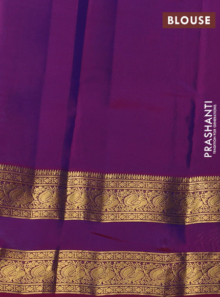 Kanchipuram silk saree dual shade of bluish green and magenta pink with zari woven buttas and rettapet zari woven border