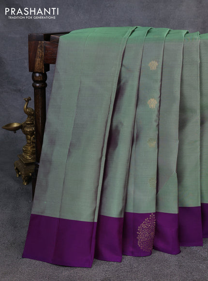 Kanchipuram silk saree pastel green and violet with zari woven buttas and zari woven border