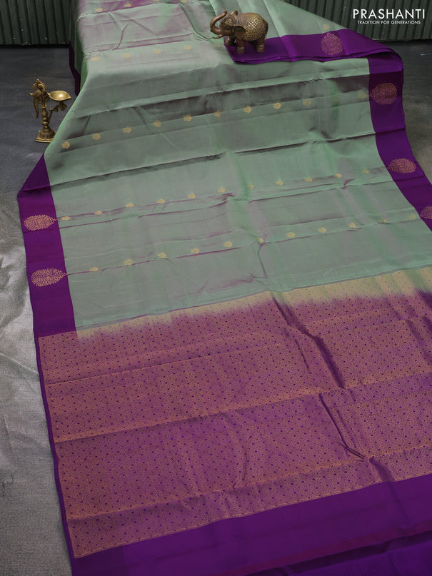 Kanchipuram silk saree pastel green and violet with zari woven buttas and zari woven border