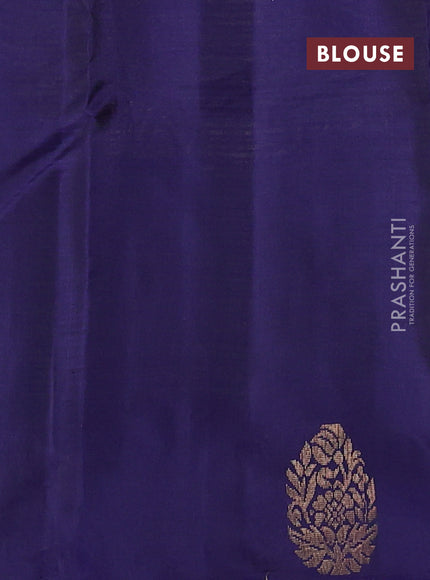 Kanchipuram silk saree bottle green and navy blue with plain body and zari woven butta border