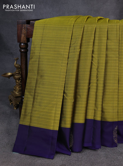 Kanchipuram silk saree mehendi green and navy blue with plain body and zari woven butta border