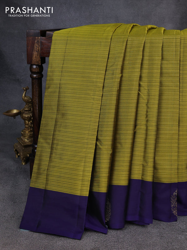 Kanchipuram silk saree mehendi green and navy blue with plain body and zari woven butta border