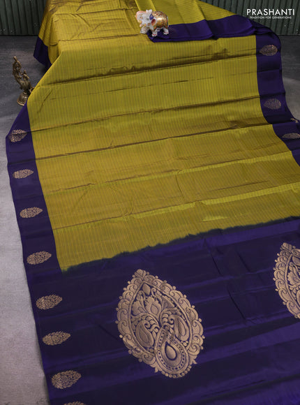 Kanchipuram silk saree mehendi green and navy blue with plain body and zari woven butta border