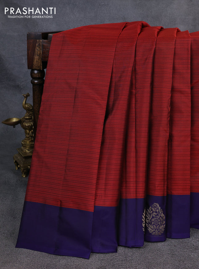 Kanchipuram silk saree maroon and navy blue with plain body and zari woven butta border