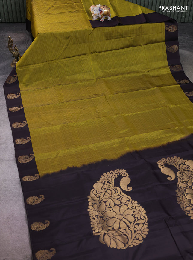 Kanchipuram silk saree mehendi green and coffee brown with plain body and paisley zari woven butta border
