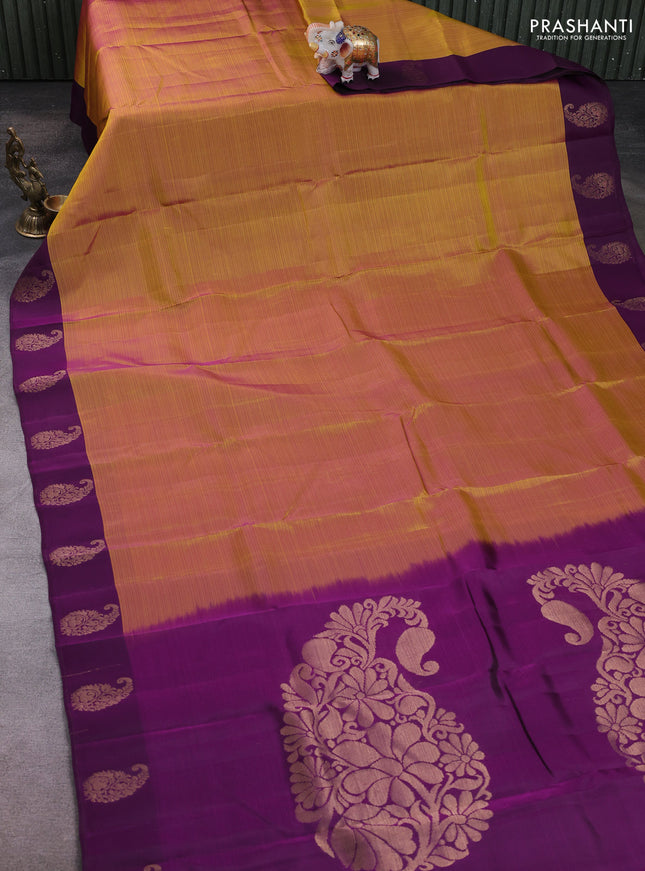Kanchipuram silk saree mustard yellow and purple with plain body and paisley zari woven butta border