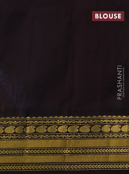 Kuppadam silk cotton saree blue shade and coffee brown with allover paisley zari woven buttas and zari woven korvai border