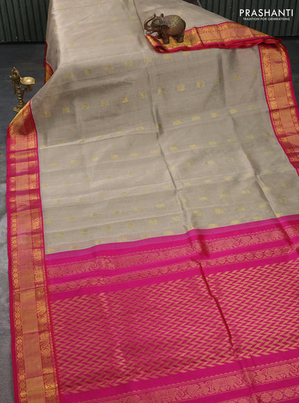 Kuppadam silk cotton saree dark beige and pink with allover zari woven buttas and rettapet zari woven korvai border
