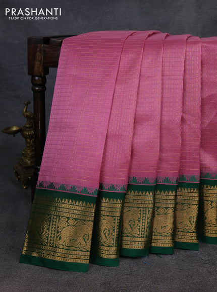 Kuppadam silk cotton saree mauve pink and green with allover laksha deepam pattern and temple design elepant zari woven border