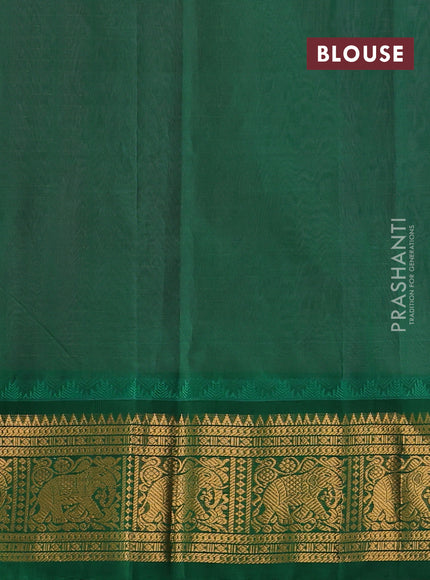 Kuppadam silk cotton saree mauve pink and green with allover laksha deepam pattern and temple design elepant zari woven border