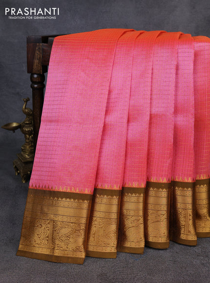 Kuppadam silk cotton saree candy pink and mustard green with allover laksha deepam pattern and temple design elepant zari woven border