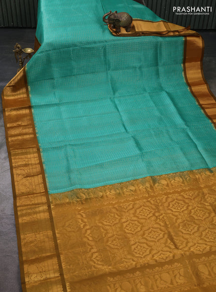 Kuppadam silk cotton saree teal green and mustard green with allover laksha deepam pattern and temple design elepant zari woven border