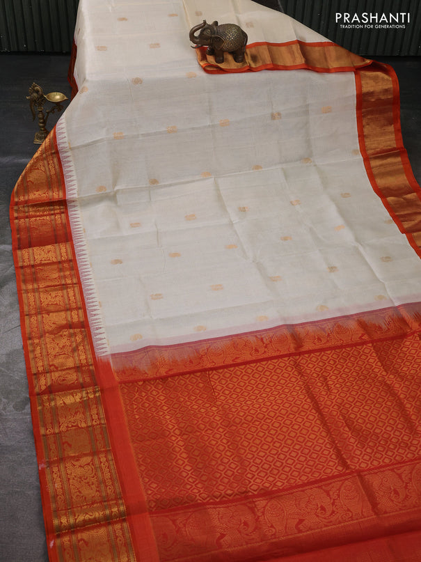 Kuppadam silk cotton saree off white and orange with allover vairaosi pattern & buttas and temple design zari woven border