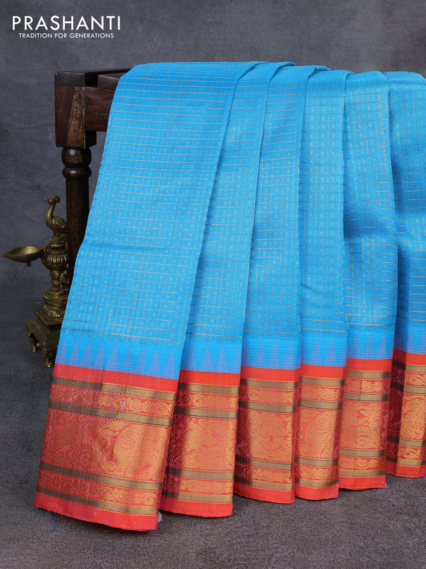 Kuppadam silk cotton saree cs blue and orange with allover laksha deepam pattern and temple design zari woven border