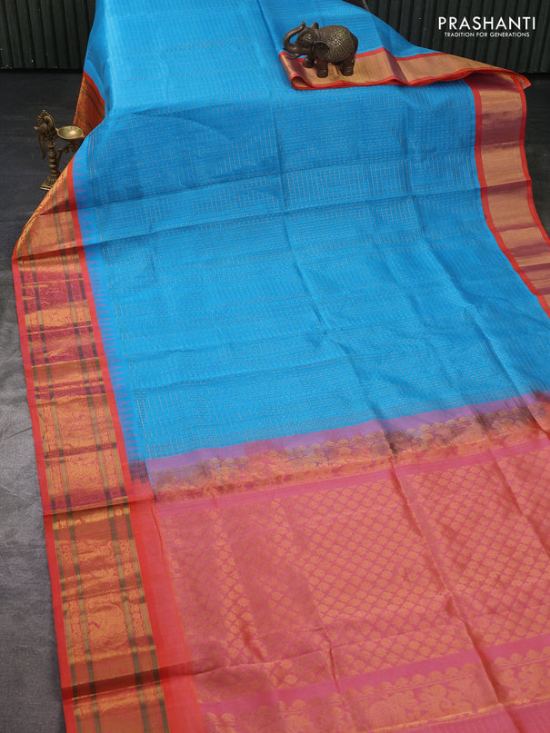 Kuppadam silk cotton saree cs blue and orange with allover laksha deepam pattern and temple design zari woven border