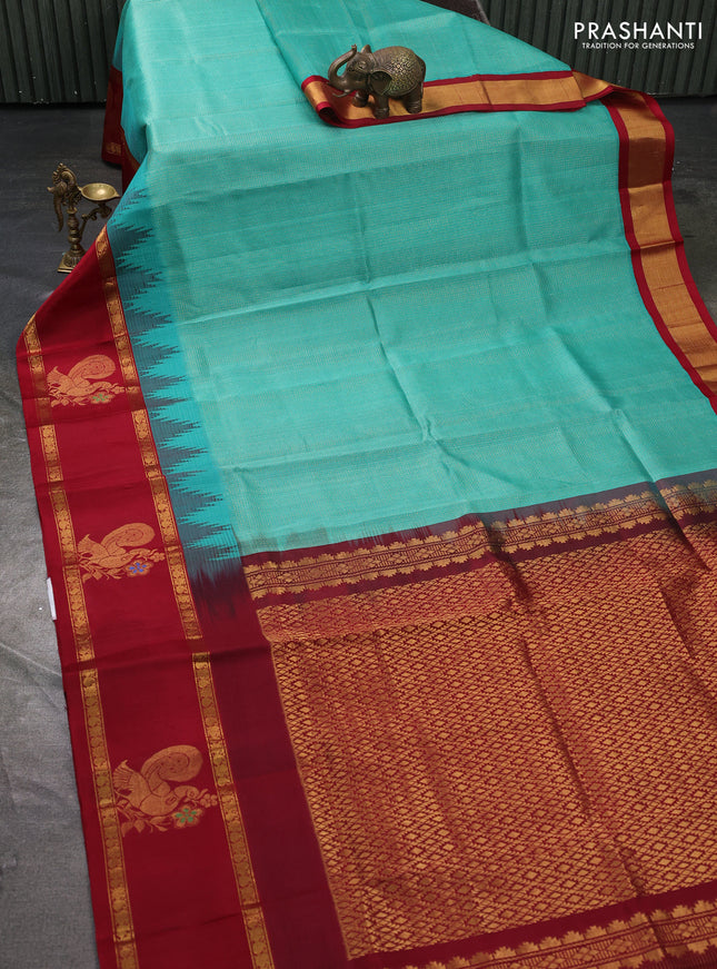 Kuppadam silk cotton saree teal green and maroon with allover small zari checked pattern and rettapet zari woven butta border