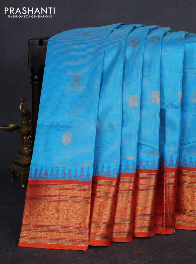 Kuppadam silk cotton saree cs blue and orange with allover vaiarosi pattern & buttas and temple design zari woven border