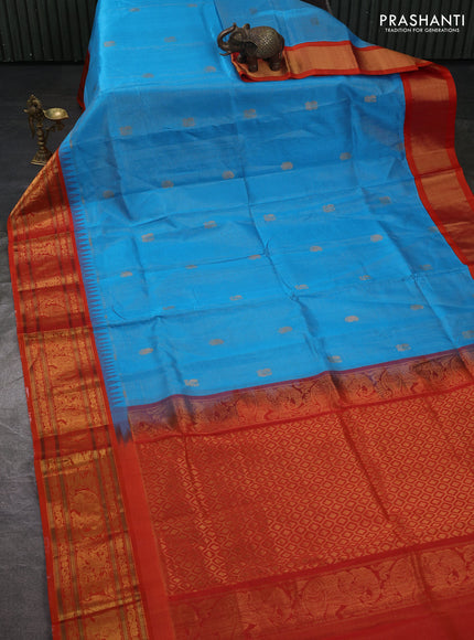 Kuppadam silk cotton saree cs blue and orange with allover vaiarosi pattern & buttas and temple design zari woven border