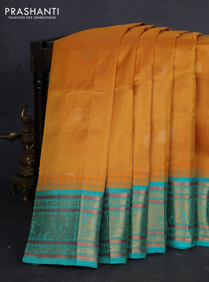 Kuppadam silk cotton saree mustard yellow and teal green with allover vaiarosi pattern & buttas and temple design zari woven border