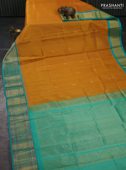 Kuppadam silk cotton saree mustard yellow and teal green with allover vaiarosi pattern & buttas and temple design zari woven border