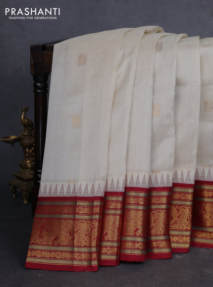 Kuppadam silk cotton saree off white and maroon with allover vaiarosi pattern & buttas and temple design zari woven border