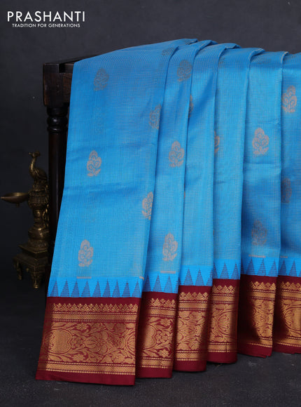 Kuppadam silk cotton saree cs blue and deep maroon with allover vaiarosi pattern & buttas and temple design zari woven border