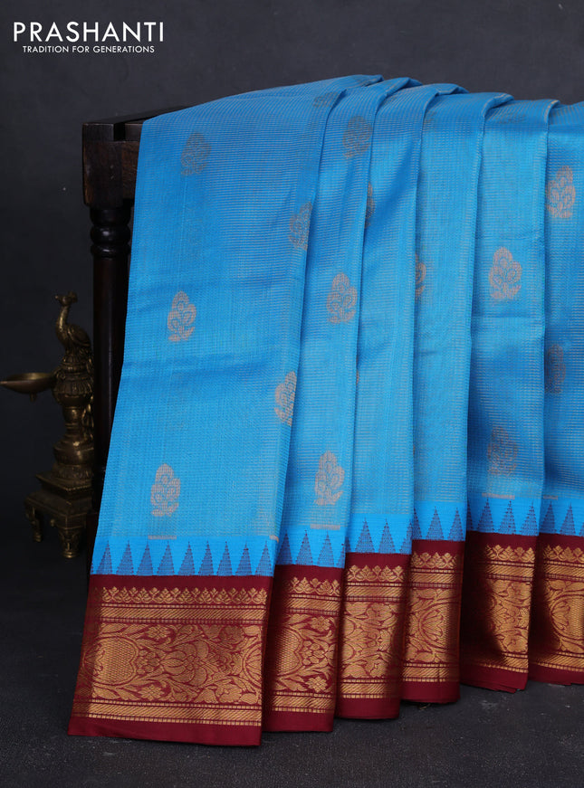 Kuppadam silk cotton saree cs blue and deep maroon with allover vaiarosi pattern & buttas and temple design zari woven border