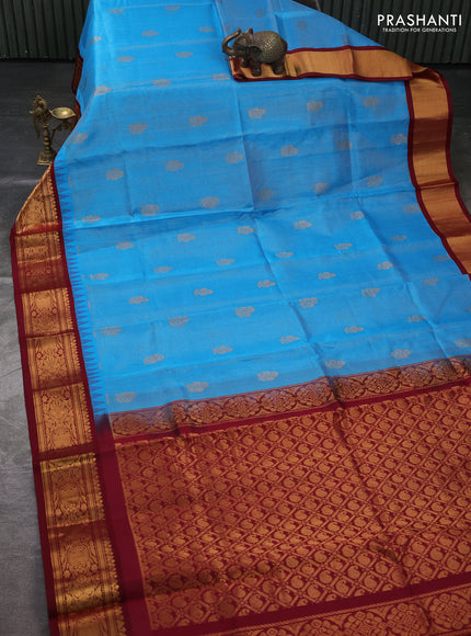 Kuppadam silk cotton saree cs blue and deep maroon with allover vaiarosi pattern & buttas and temple design zari woven border