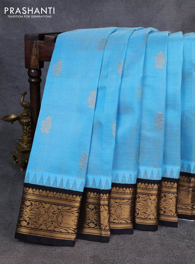 Kuppadam silk cotton saree teal blue and black with allover vaiarosi pattern & buttas and temple design zari woven border