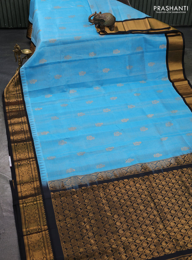 Kuppadam silk cotton saree teal blue and black with allover vaiarosi pattern & buttas and temple design zari woven border