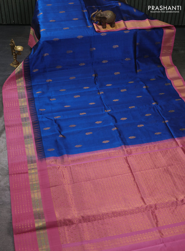 Kuppadam silk cotton saree peacock green and mauve pink with zari woven buttas and temple design zari woven butta border