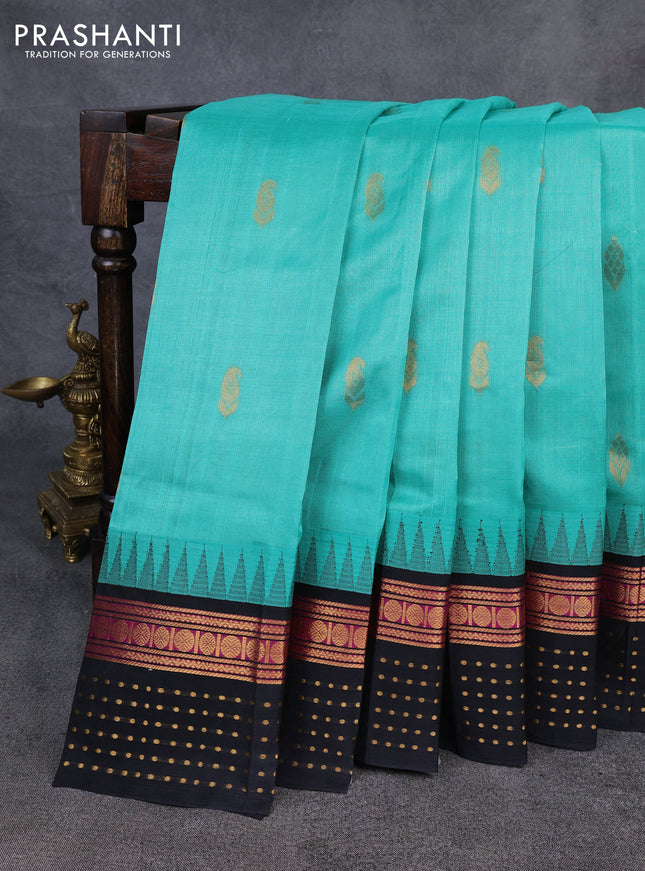 Kuppadam silk cotton saree teal green and black with zari woven buttas and temple design zari woven butta border