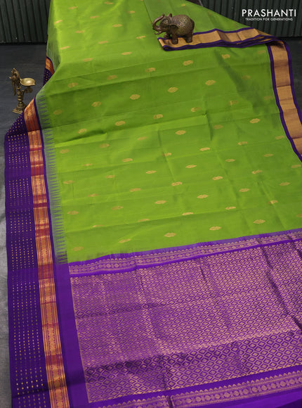 Kuppadam silk cotton saree light green and violet with zari woven buttas and temple design zari woven butta border