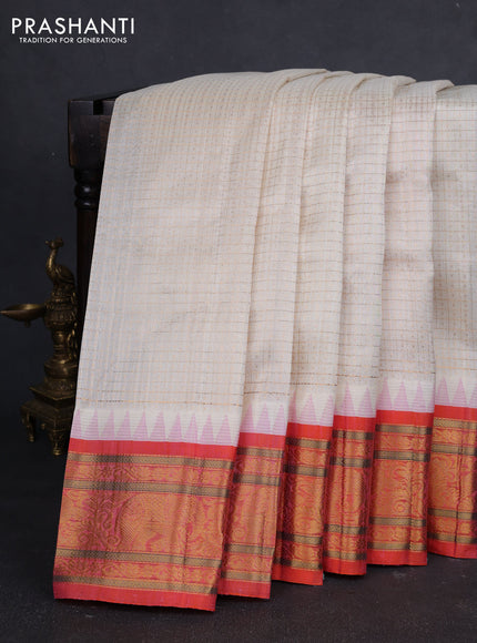 Kuppadam silk cotton saree off white and orange with allover laksha deepam pattern and temple design zari woven border