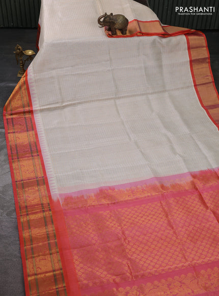 Kuppadam silk cotton saree off white and orange with allover laksha deepam pattern and temple design zari woven border