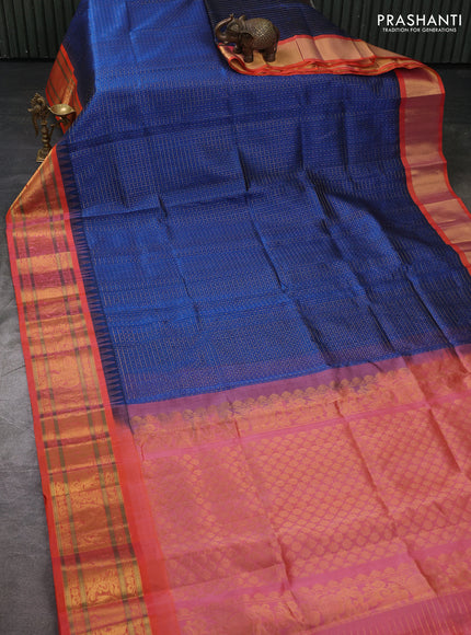 Kuppadam silk cotton saree peacock blue and orange with allover laksha deepam pattern and temple design zari woven border