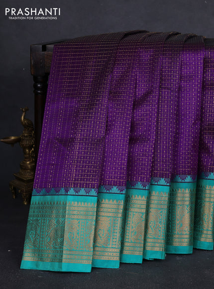 Kuppadam silk cotton saree purple and teal green with allover laksha deepam pattern and temple design zari woven border