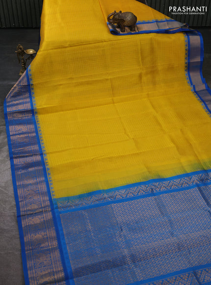 Kuppadam silk cotton saree yellow and cs blue with allover laksha deepam pattern and temple design zari woven border