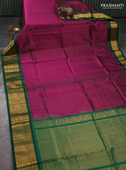 Kuppadam silk cotton saree deep purple and green with allover laksha deepam pattern and temple design zari woven border