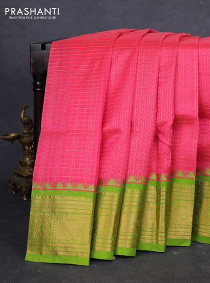 Kuppadam silk cotton saree candy pink and light green with allover laksha deepam pattern and temple design zari woven border
