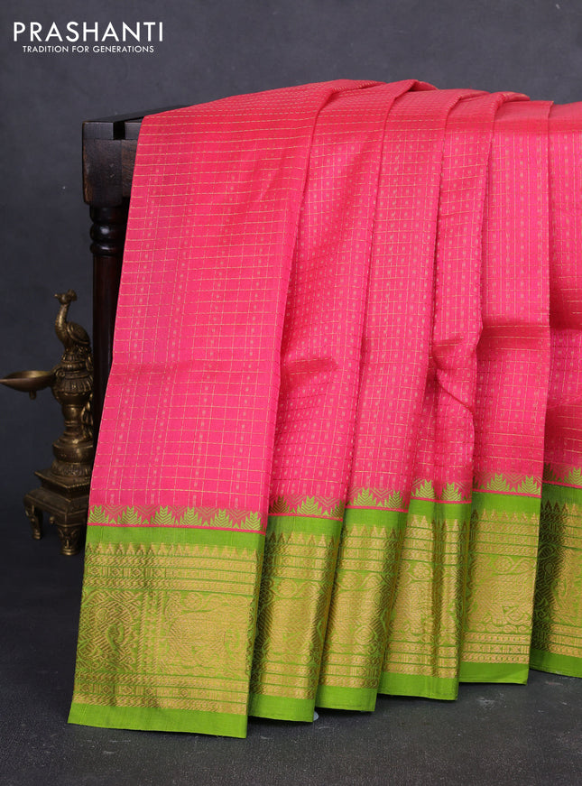 Kuppadam silk cotton saree candy pink and light green with allover laksha deepam pattern and temple design zari woven border