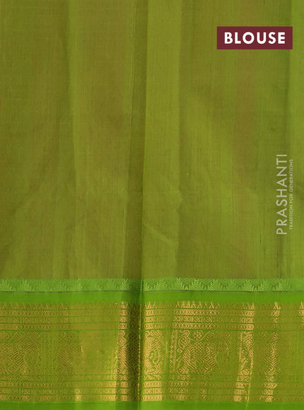 Kuppadam silk cotton saree candy pink and light green with allover laksha deepam pattern and temple design zari woven border