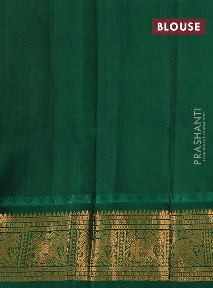 Kuppadam silk cotton saree deep wine shade and green with allover laksha deepam pattern and temple design zari woven border
