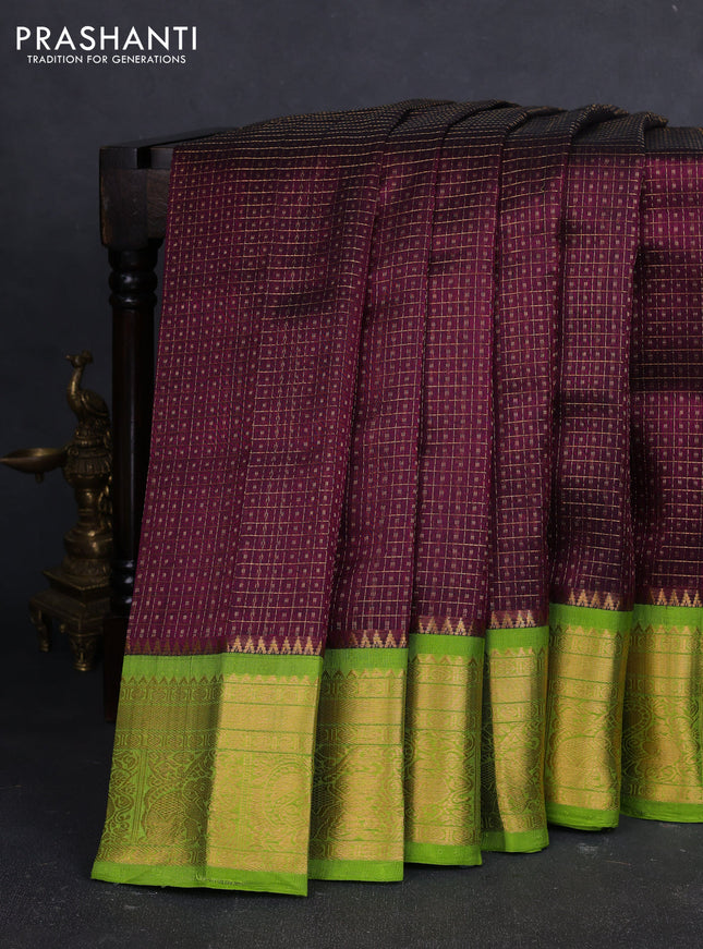 Kuppadam silk cotton saree deep wine shade and light green with allover laksha deepam pattern and temple design zari woven border