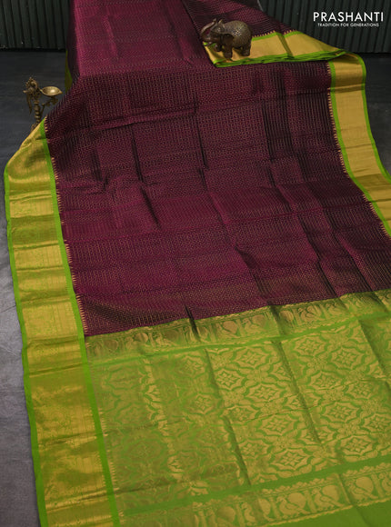 Kuppadam silk cotton saree deep wine shade and light green with allover laksha deepam pattern and temple design zari woven border