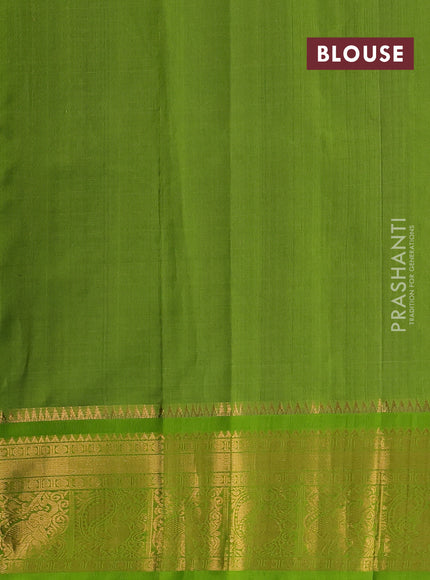 Kuppadam silk cotton saree deep wine shade and light green with allover laksha deepam pattern and temple design zari woven border