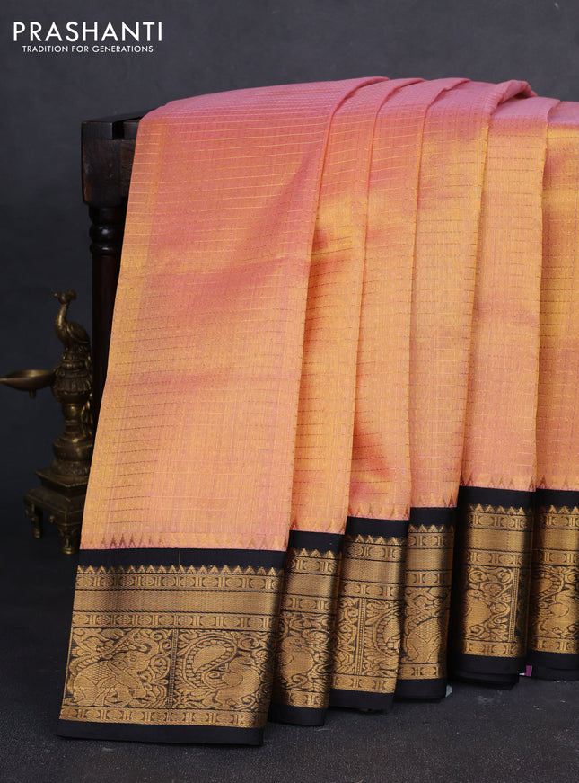 Kuppadam silk cotton saree peach shade and black with allover laksha deepam pattern and temple design zari woven border