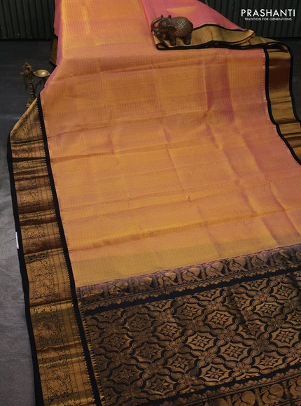Kuppadam silk cotton saree peach shade and black with allover laksha deepam pattern and temple design zari woven border